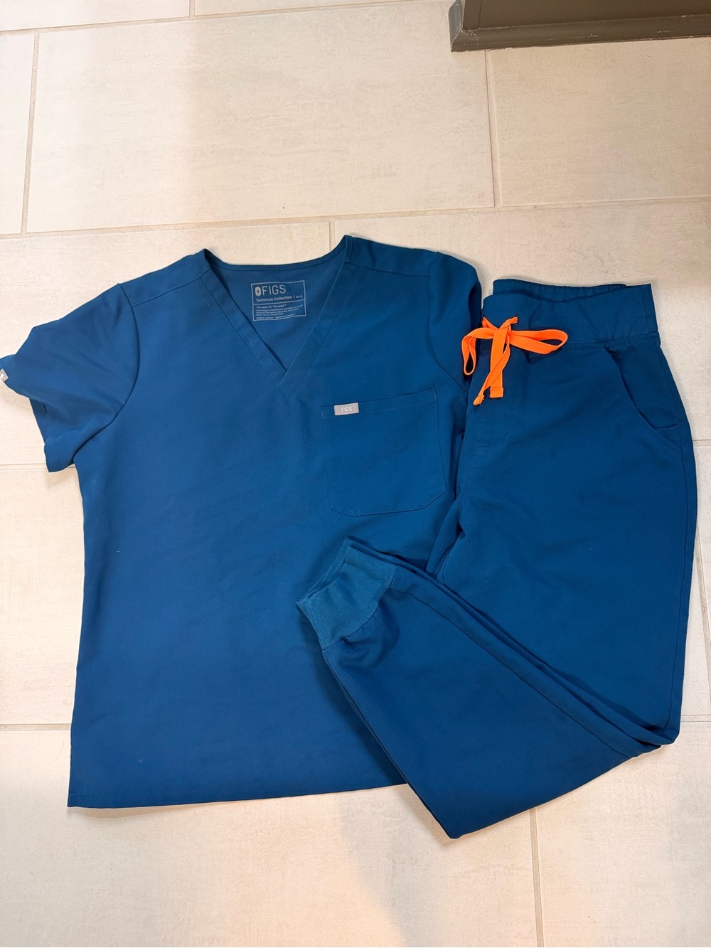 Figs Kids Pajama Set in Navy with Bright Orange Drawstring